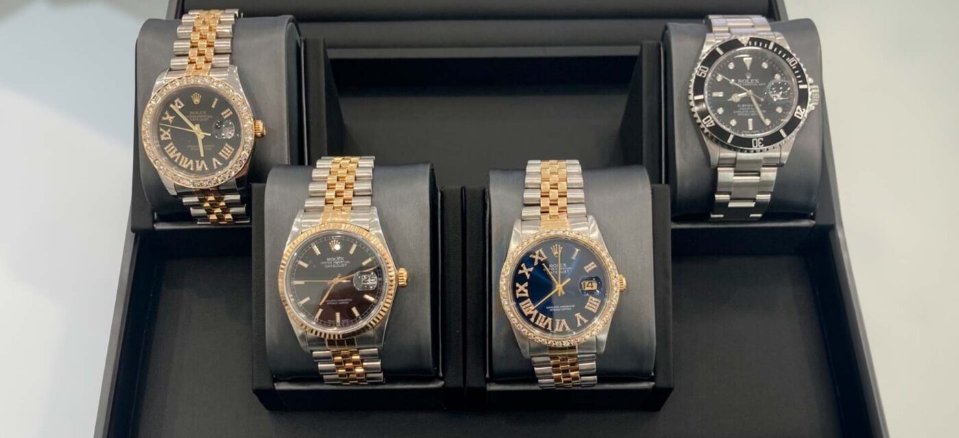 Collezione di orologi Rolex, inclusi modelli in oro e acciaio come il Datejust e Submariner, ideali per scoprire come vendere un Rolex usato